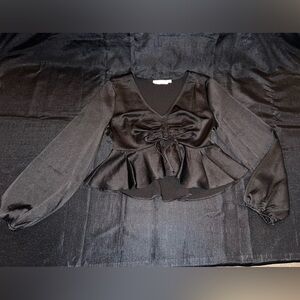 All in Favor Tie Front Satin Peplum Top in Black